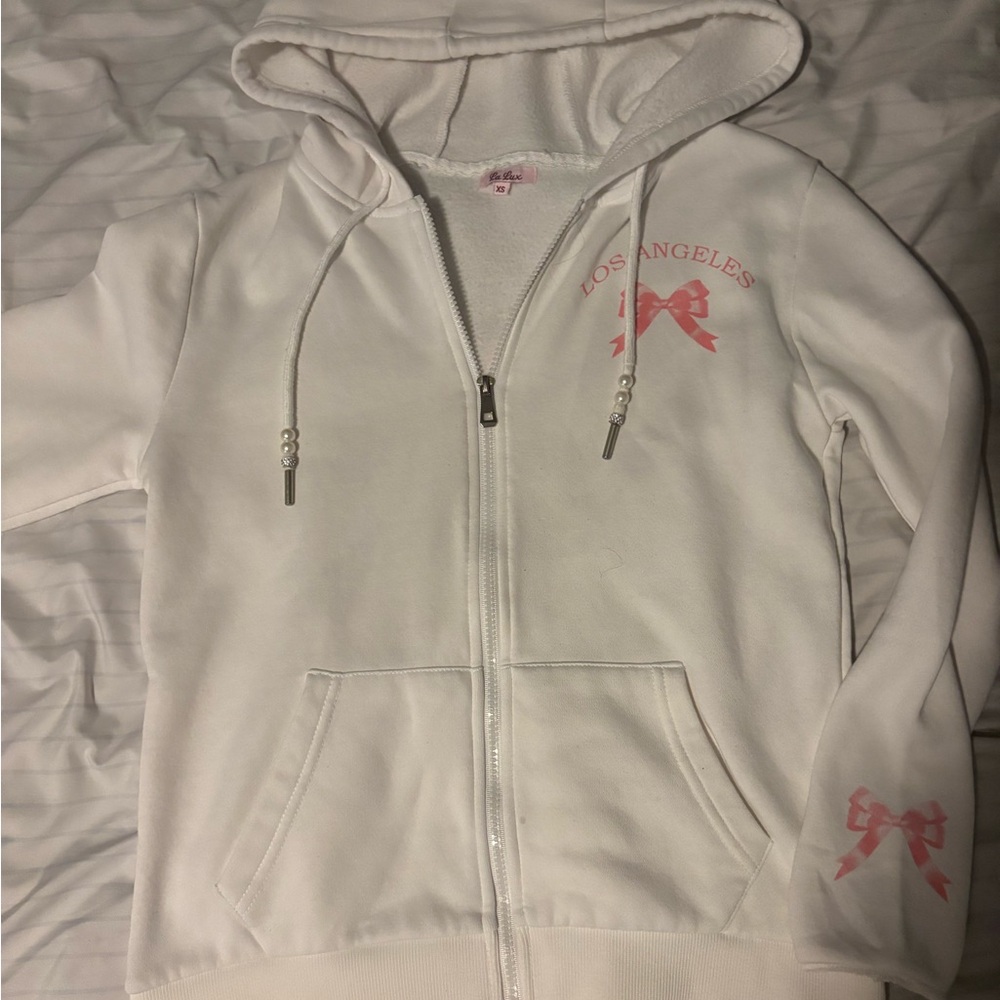 White Hoodie with Pink Bow Design